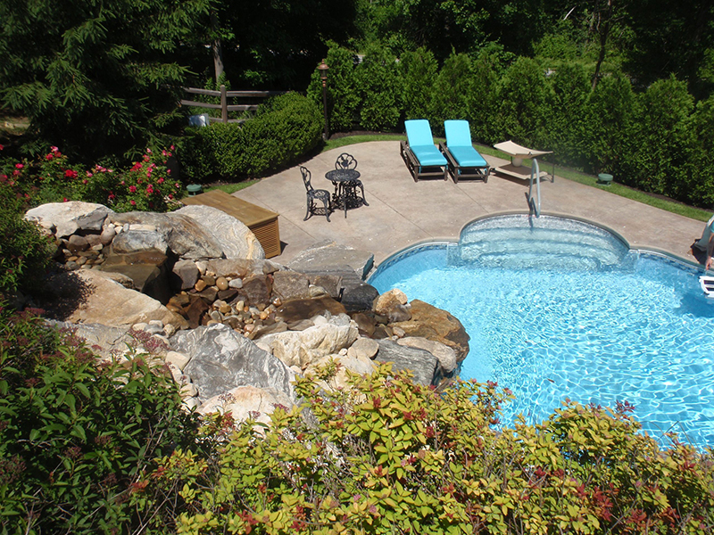 Swimming pool and stamped concrete project example 48